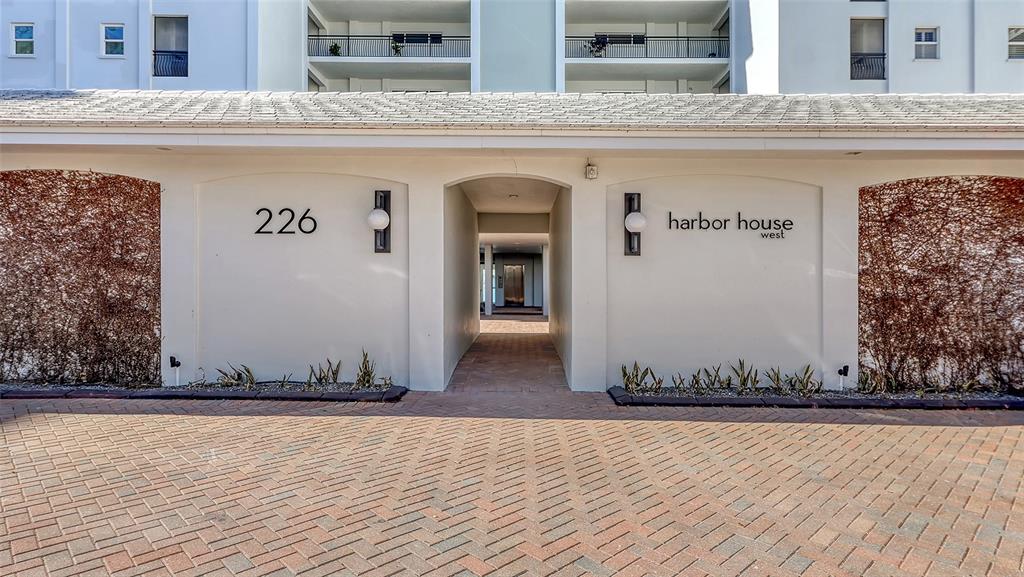 226 Golden Gate Point, Unit 24 Sarasota, FL 34236 - Photo 1 of 1 a view of building with hallway
