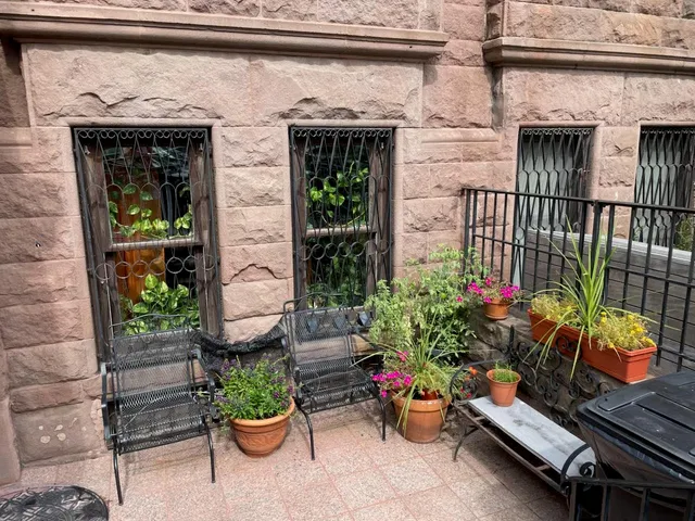 a outdoor sitting area with a couch