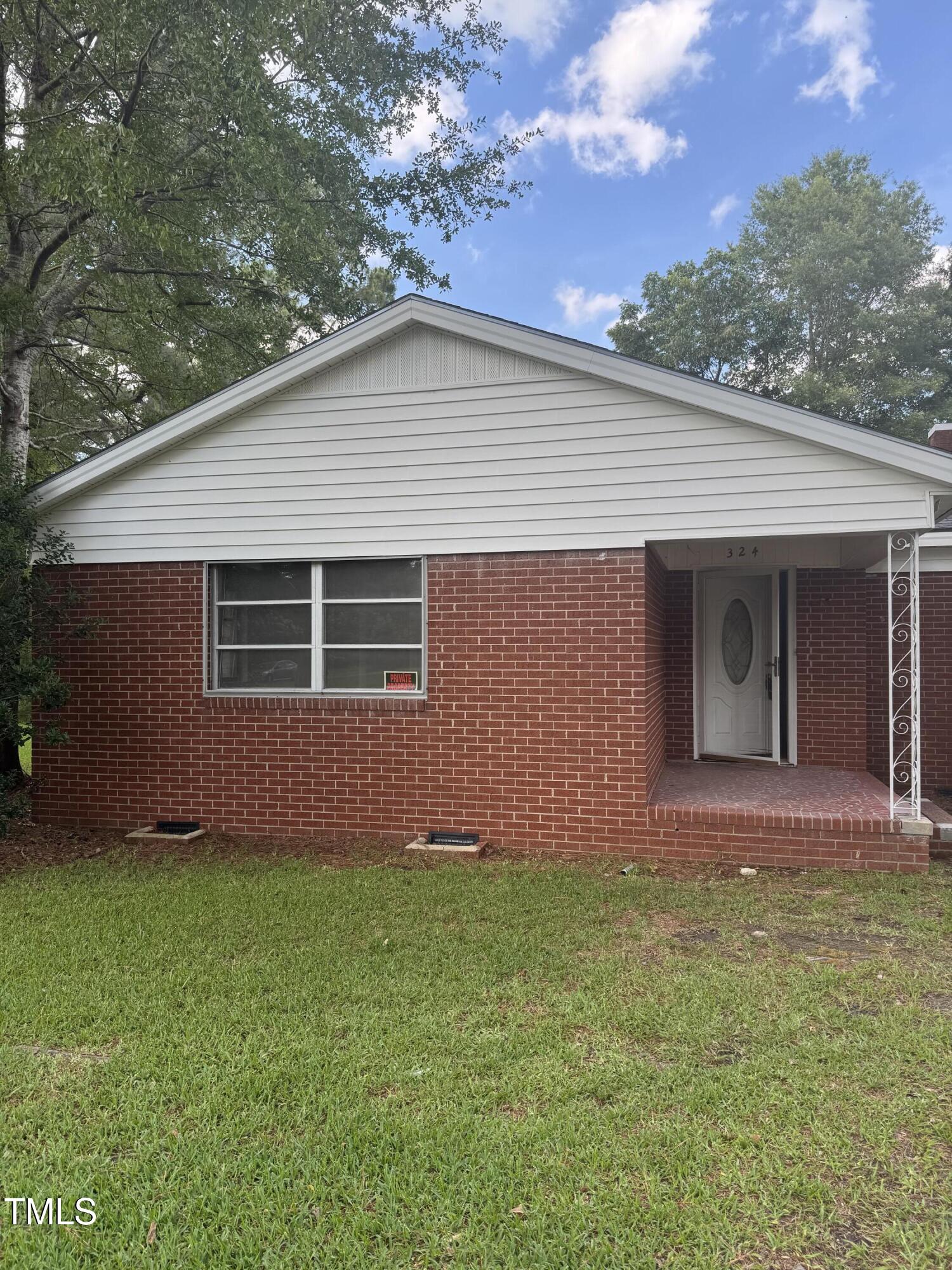 324 Bank Street Roper, NC 27970 - Photo 9 of 21 a front view of a house with garden