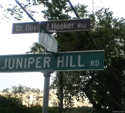 a street sign that is on a pole