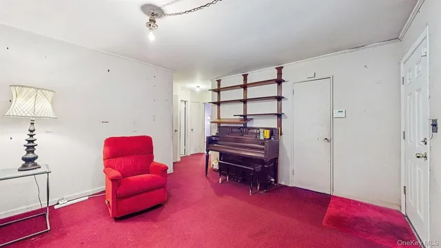 a room with furniture and a wooden floor