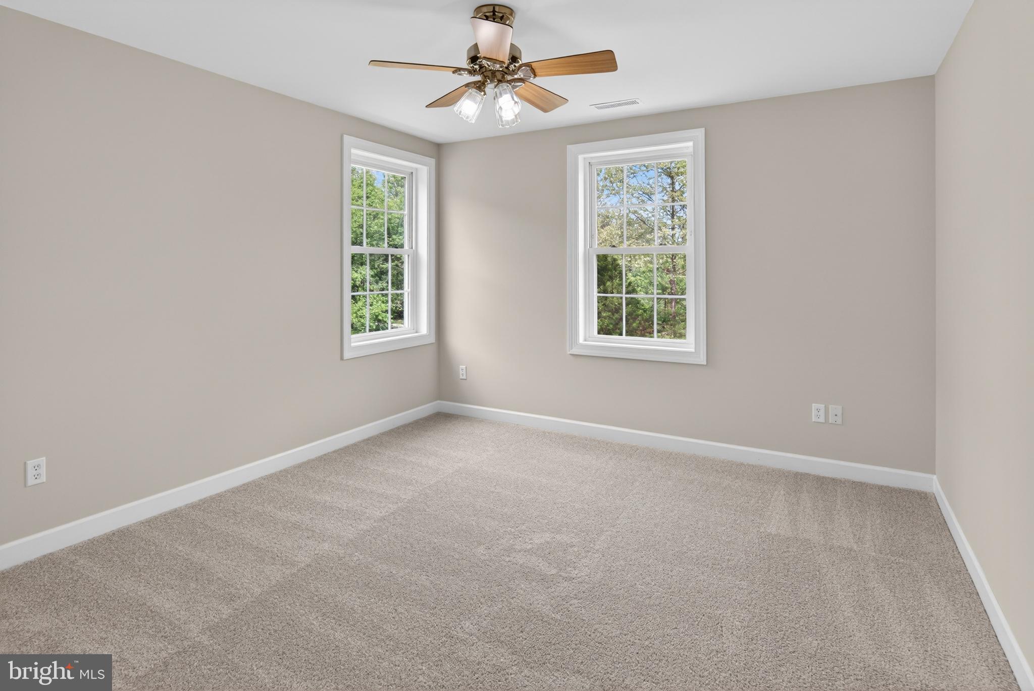 337 Roe Ingleside Road Centreville, MD 21617 - Photo 36 of 56 an empty room with windows and fan