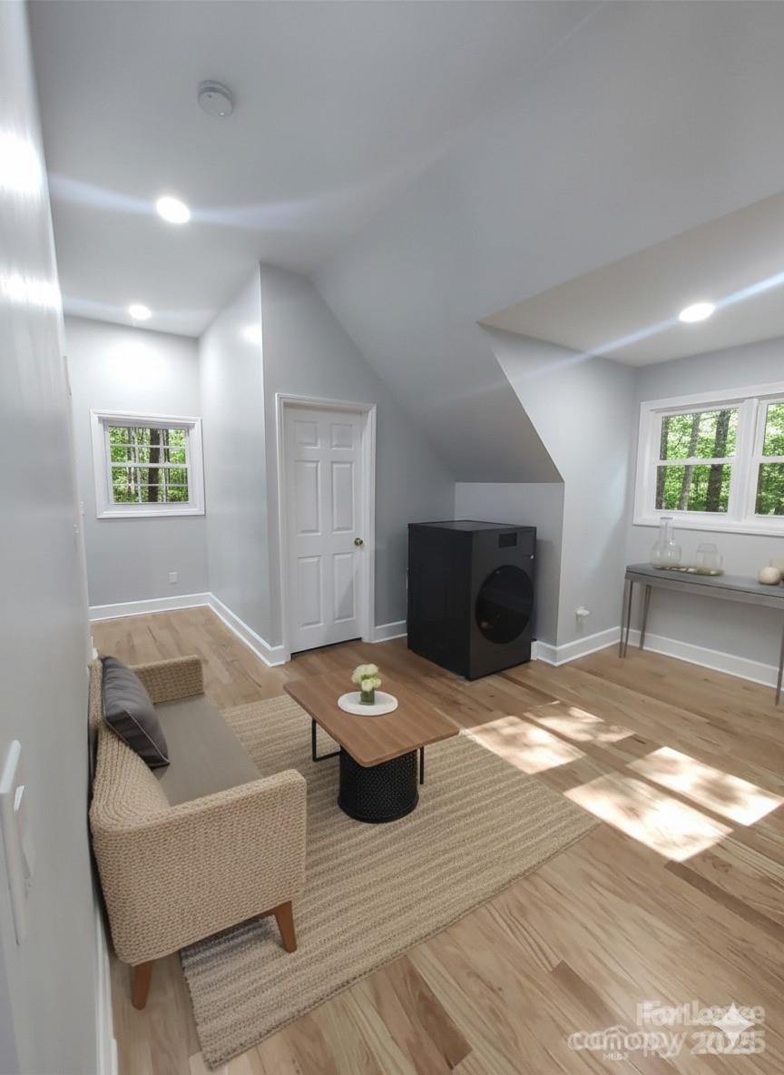 14625 Phillips Road, Unit 2 Matthews, NC 28105 - Photo 5 of 7 a living room with furniture and a fireplace
