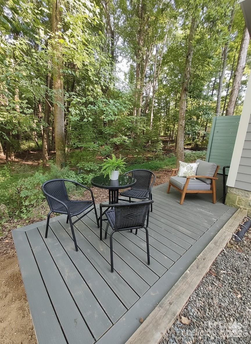 14625 Phillips Road, Unit 2 Matthews, NC 28105 - Photo 7 of 7 a sitting area with furniture and a backyard