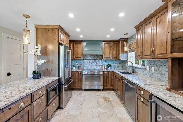 a view of a room with a large window and front door