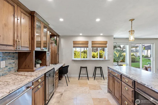 a view of swimming pool outdoor seating and city view
