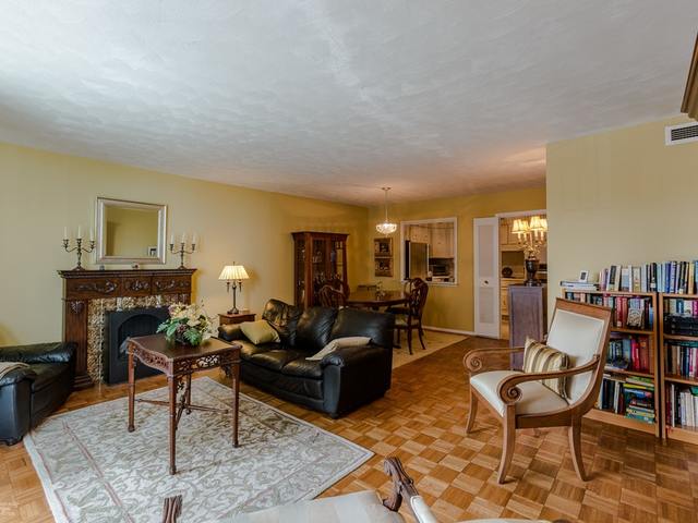 5901 North Sheridan Road, Unit 6G Chicago, IL 60660 - Photo 7 of 24 a living room with furniture and a fireplace