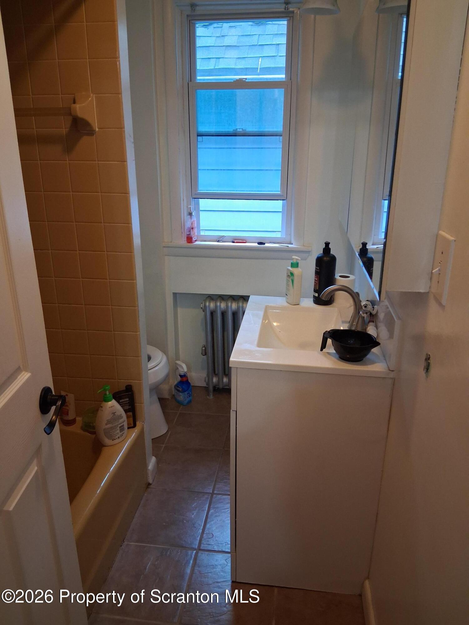 611 Moosic Street Scranton, PA 18505 - Photo 18 of 24 a utility room with dryer and washer