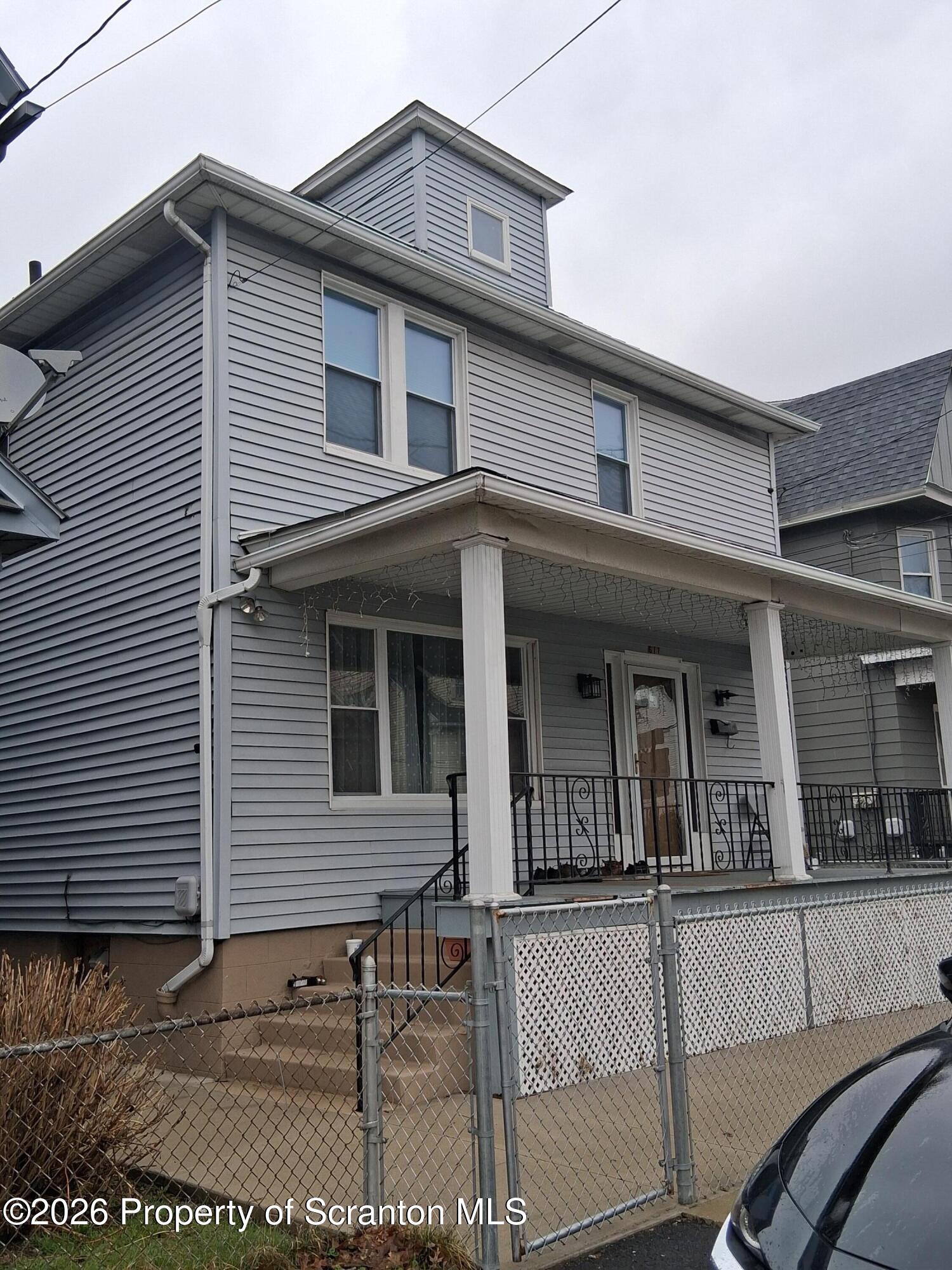 611 Moosic Street Scranton, PA 18505 - Photo 2 of 24 a view of a house with a patio