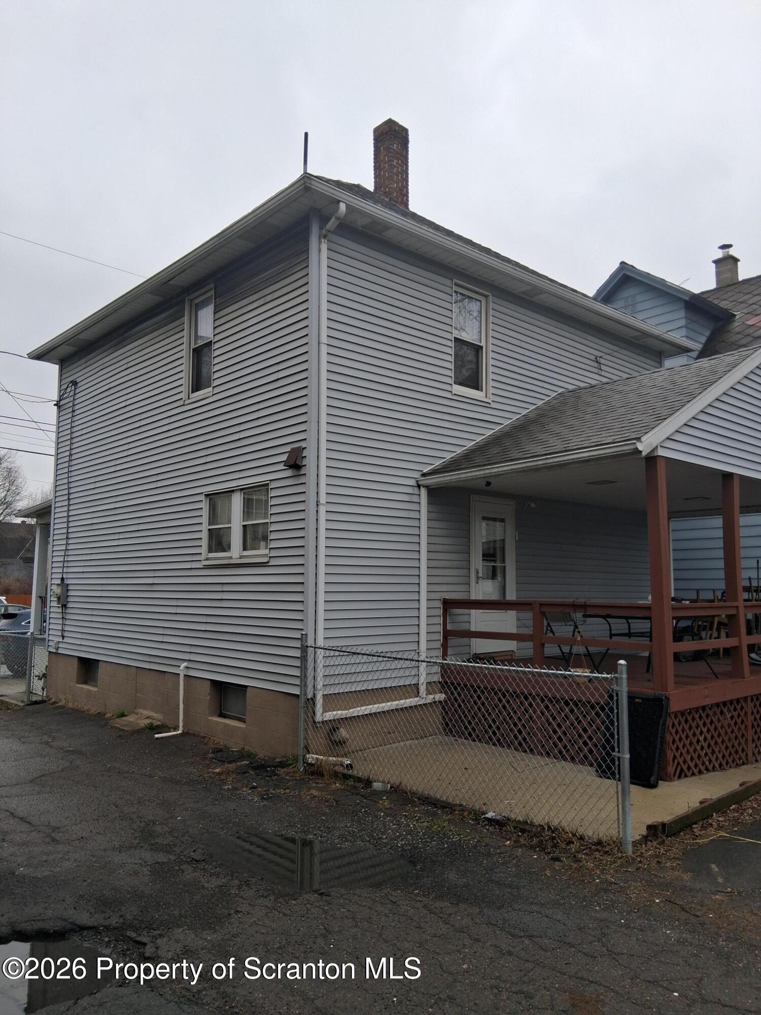 611 Moosic Street Scranton, PA 18505 - Photo 4 of 24 a view of a house with a barbeque