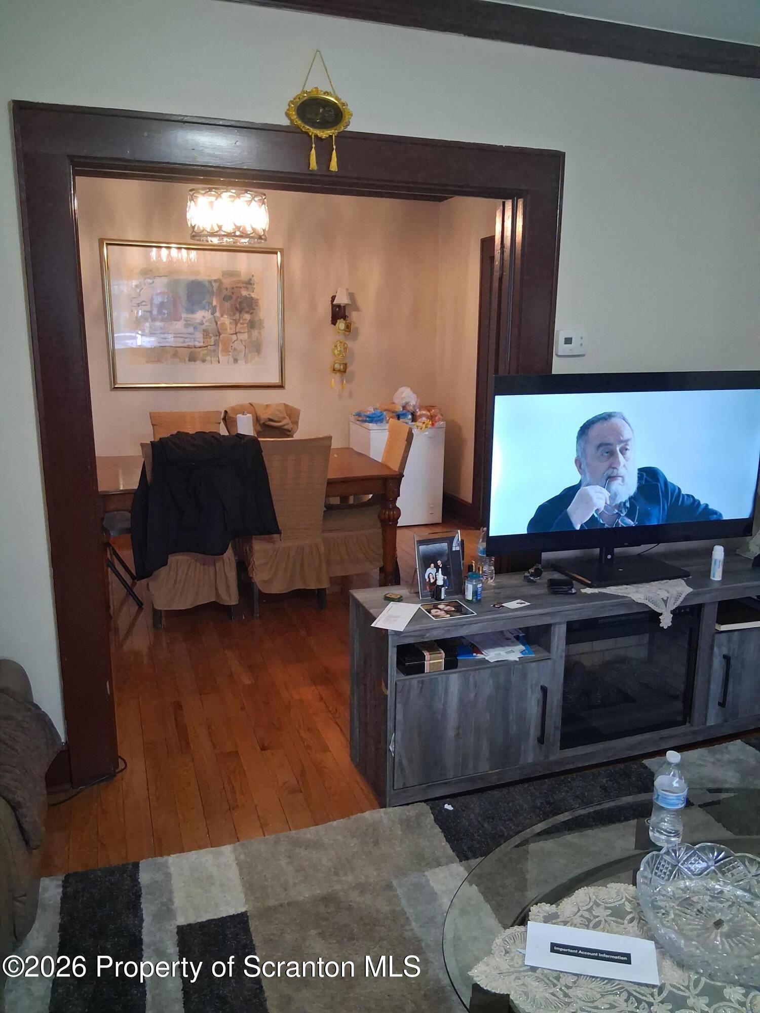611 Moosic Street Scranton, PA 18505 - Photo 8 of 24 a kitchen with stainless steel appliances granite countertop a stove a sink and a refrigerator