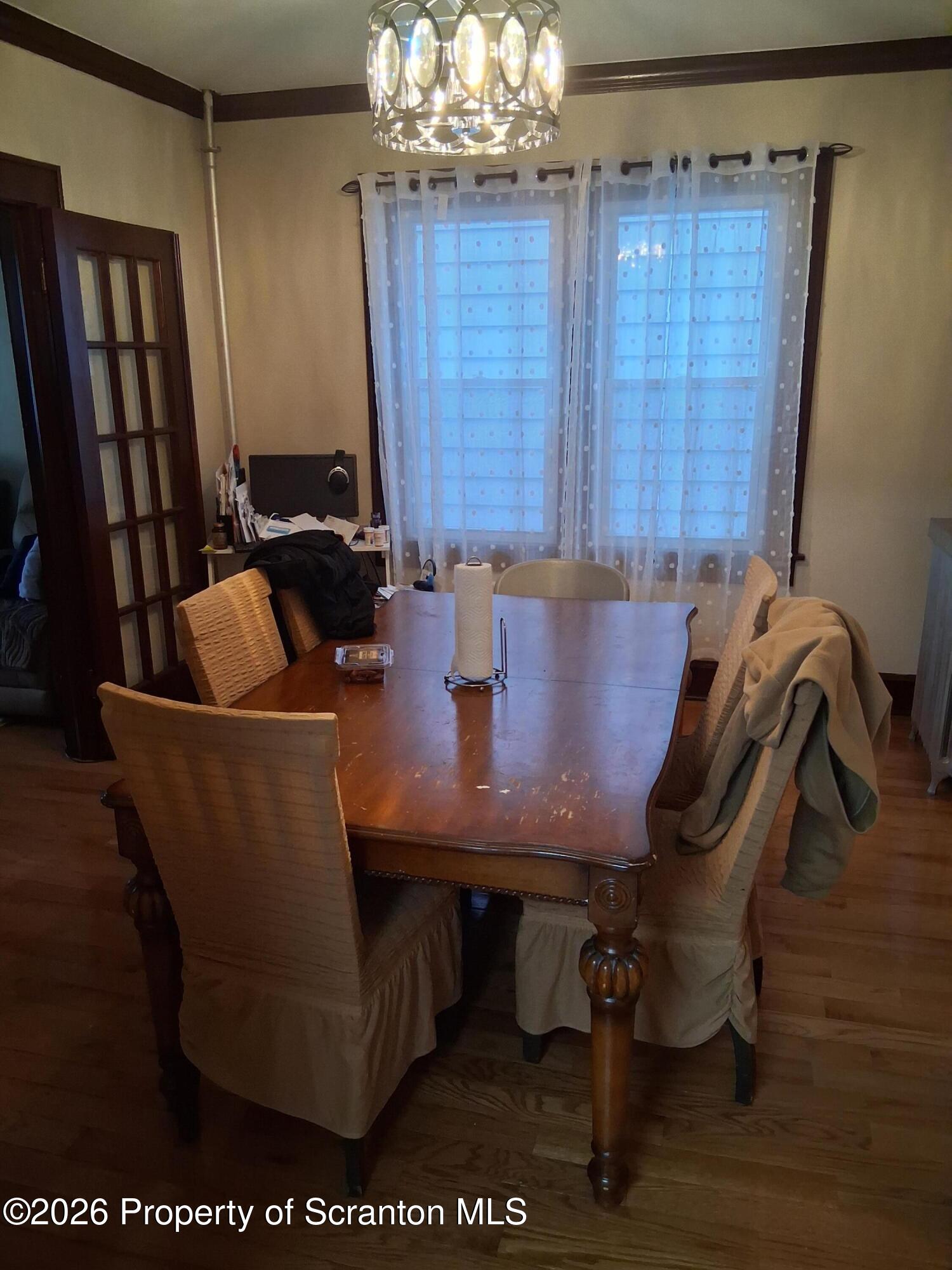 611 Moosic Street Scranton, PA 18505 - Photo 9 of 24 a dining room with furniture and window