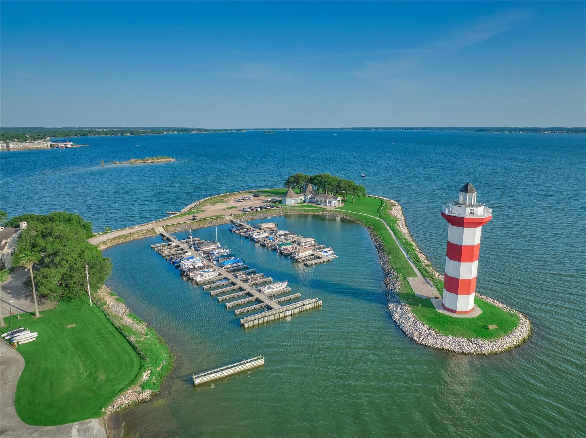 1428 Bowsprit Point Willis, TX 77318 - Photo 45 of 47 Harbour Town is home to the iconic Lake Conroe lighthouse- a beloved local landmark and favorite photo spot!