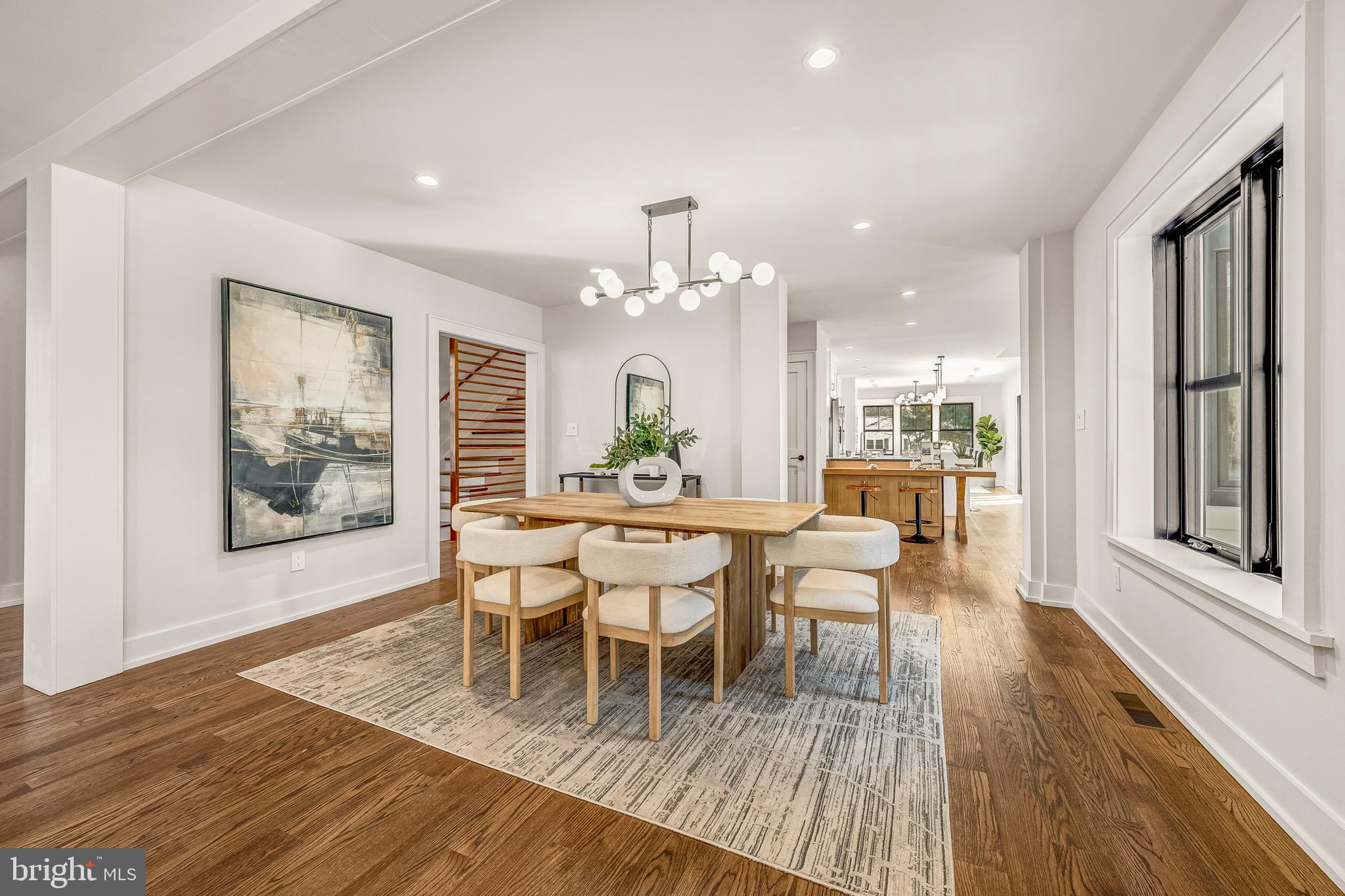 5921 Chesterbrook Road McLean, VA 22101 - Photo 15 of 76 a view of a dining room with furniture window and wooden floor