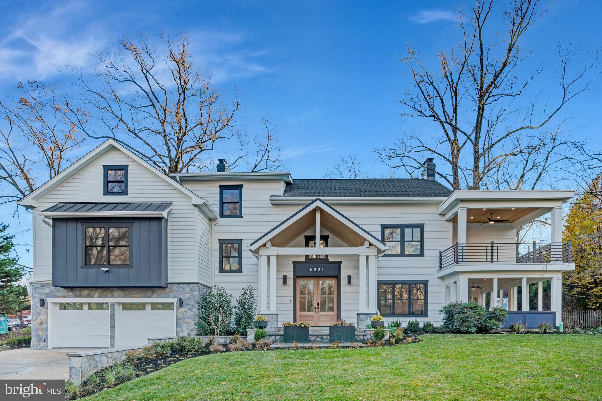 5921 Chesterbrook Road McLean, VA 22101 - Photo 3 of 76 front view of a house with a yard