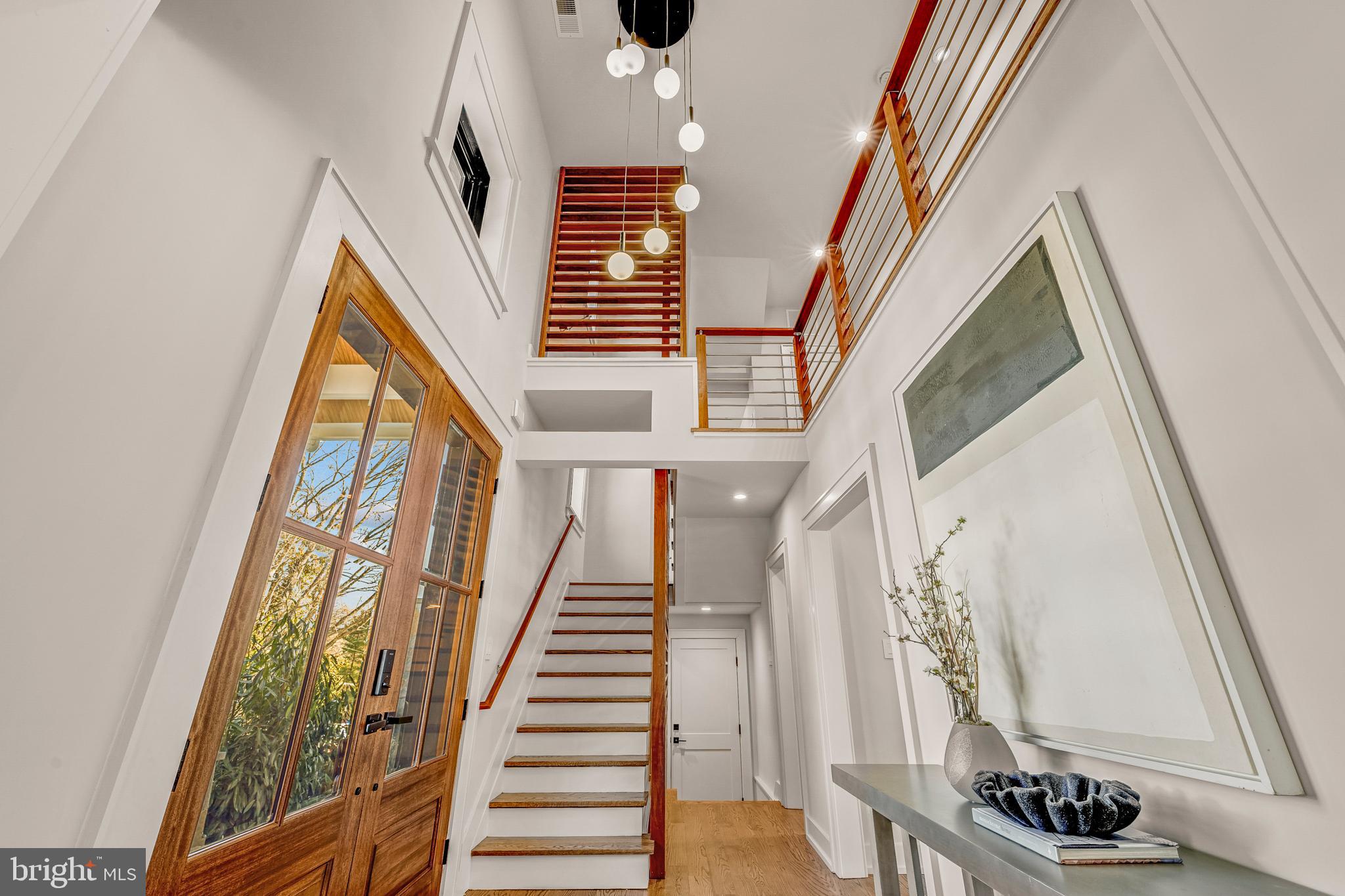 5921 Chesterbrook Road McLean, VA 22101 - Photo 36 of 76 a view of an entryway with wooden floor