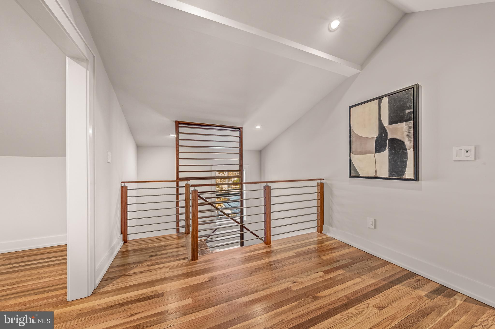 5921 Chesterbrook Road McLean, VA 22101 - Photo 58 of 76 a view of empty room with wooden floor and fan