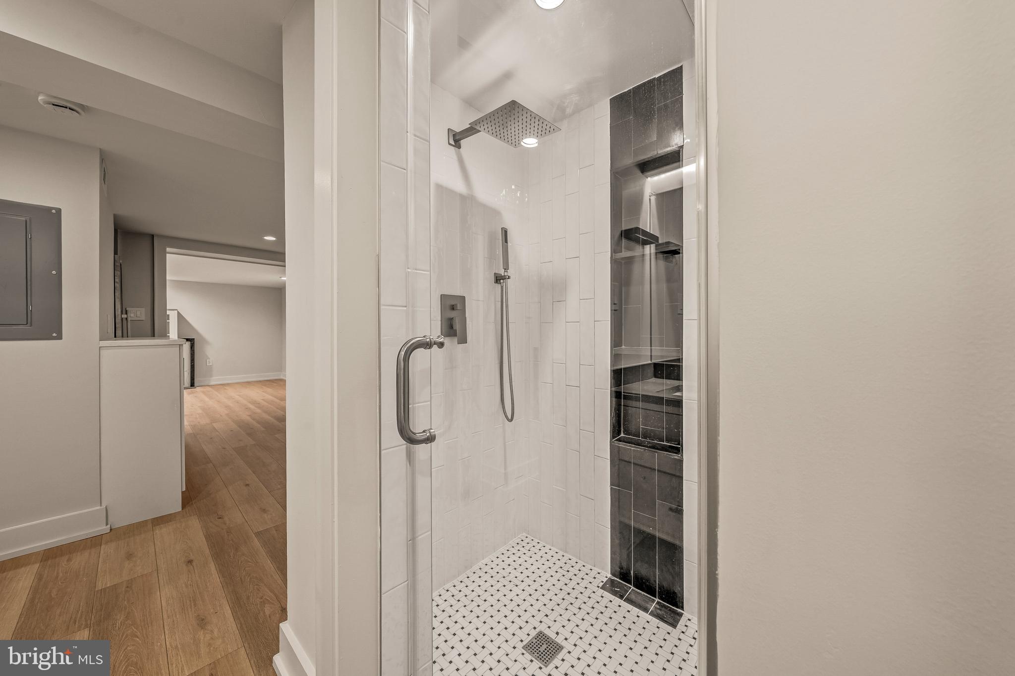 5921 Chesterbrook Road McLean, VA 22101 - Photo 70 of 76 a bathroom with a shower