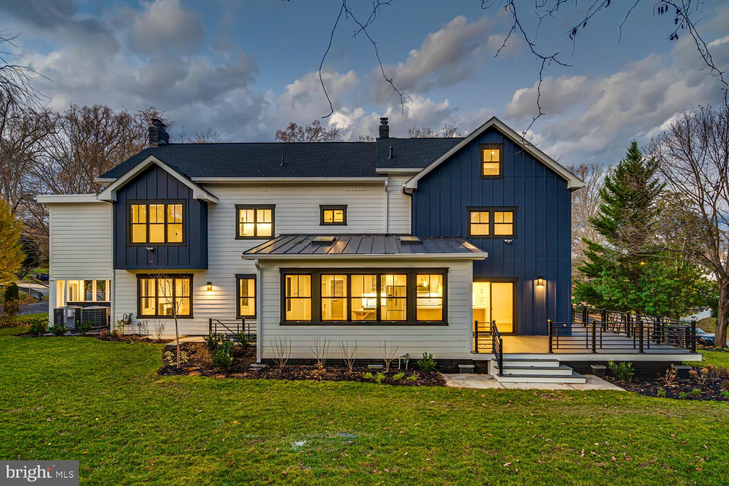 5921 Chesterbrook Road McLean, VA 22101 - Photo 76 of 76 a front view of a house with a yard