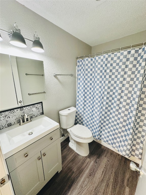 1314 Southport Drive, Unit C Austin, TX 78704 - Photo 17 of 22 a bathroom with a sink toilet and vanity