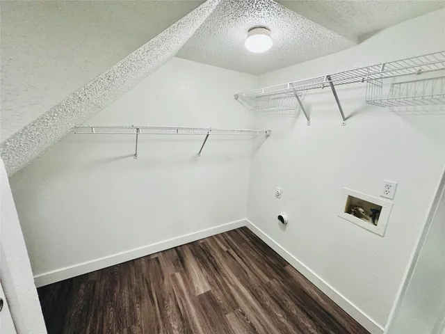 a view of a room with racks on the wall