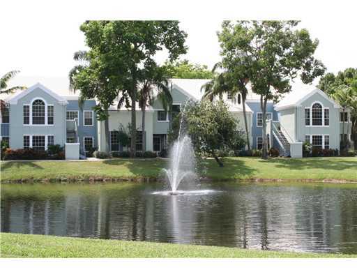 1335 Crystal Way, Unit J Delray Beach, FL 33444 - Photo 6 of 6 a view of a house with a yard