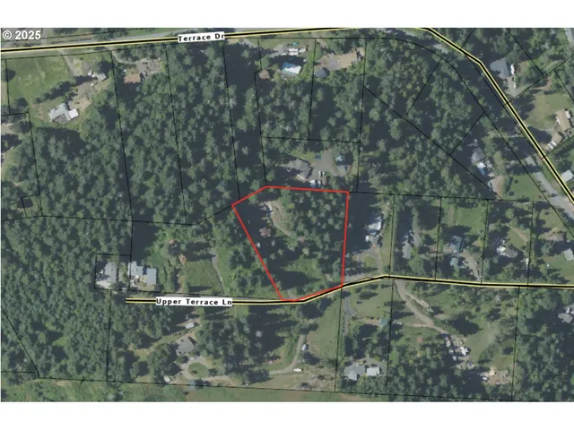 a kitchen with stainless steel appliances granite countertop a sink a stove and a wooden floors