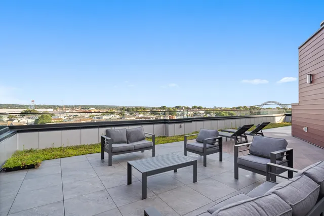 a view of a terrace with sitting area