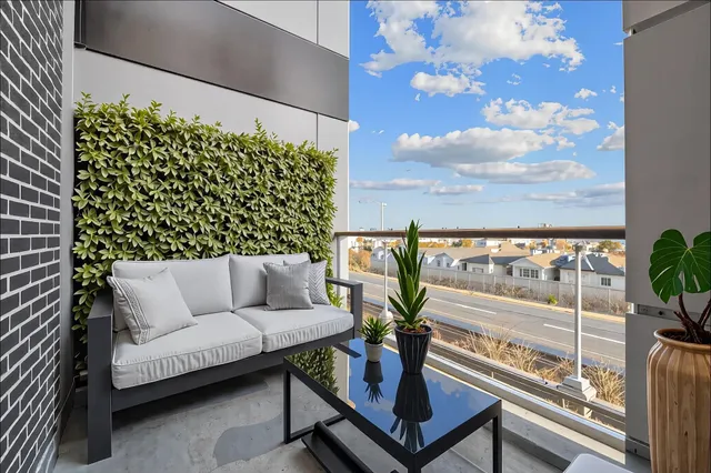 a bathroom with a sink a toilet a mirror and bathtub