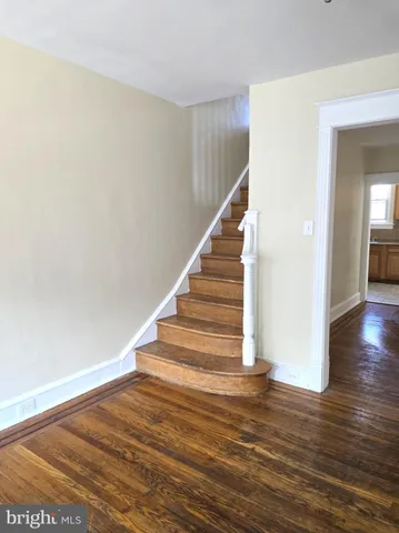 a view of entryway with wooden floor