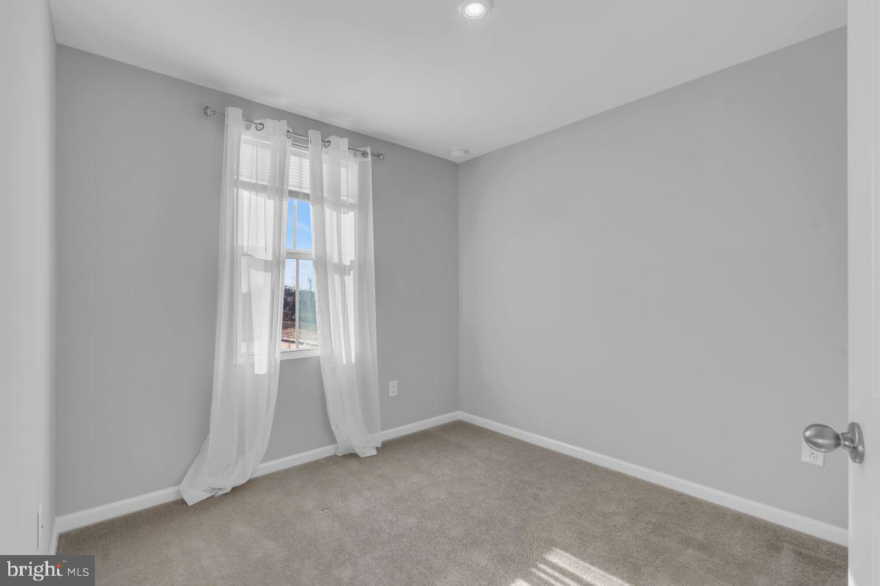 1 Wendowski Street Beverly, NJ 08010 - Photo 19 of 50 a view of an empty room with a window