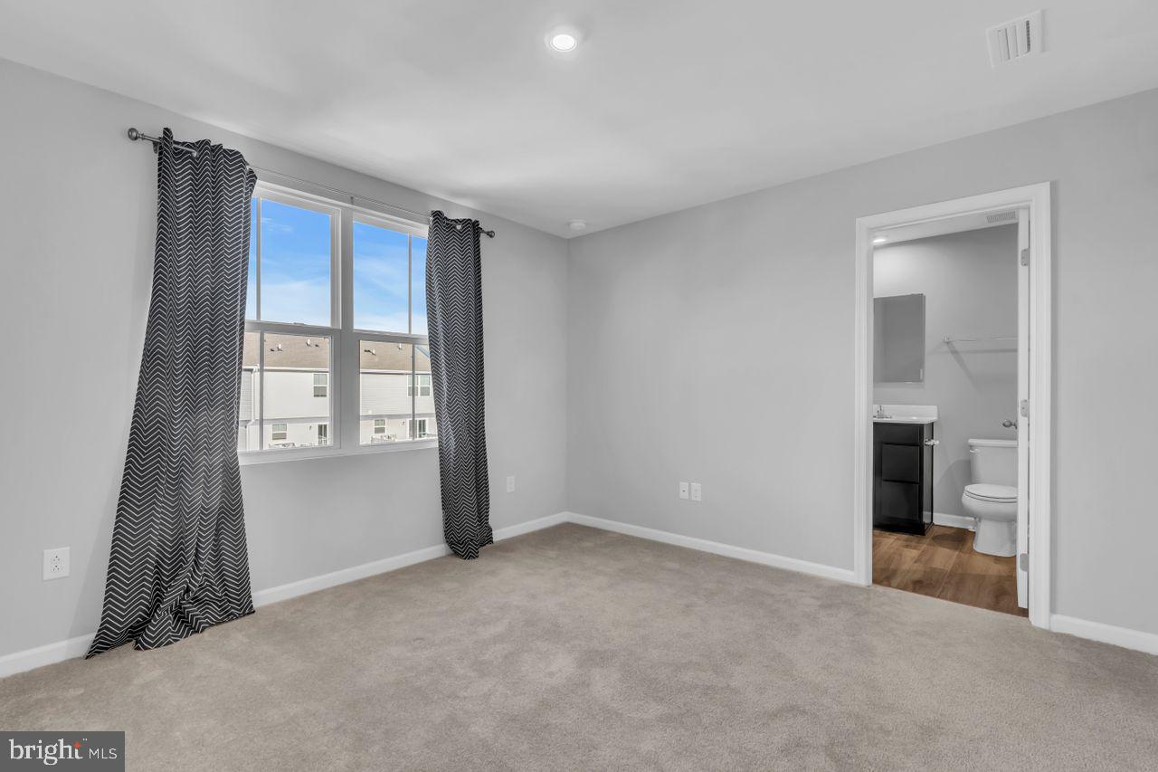 1 Wendowski Street Beverly, NJ 08010 - Photo 23 of 50 an empty room with windows