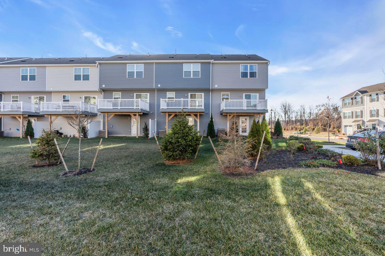 1 Wendowski Street Beverly, NJ 08010 - Photo 43 of 50 a view of a house with a yard and sitting area