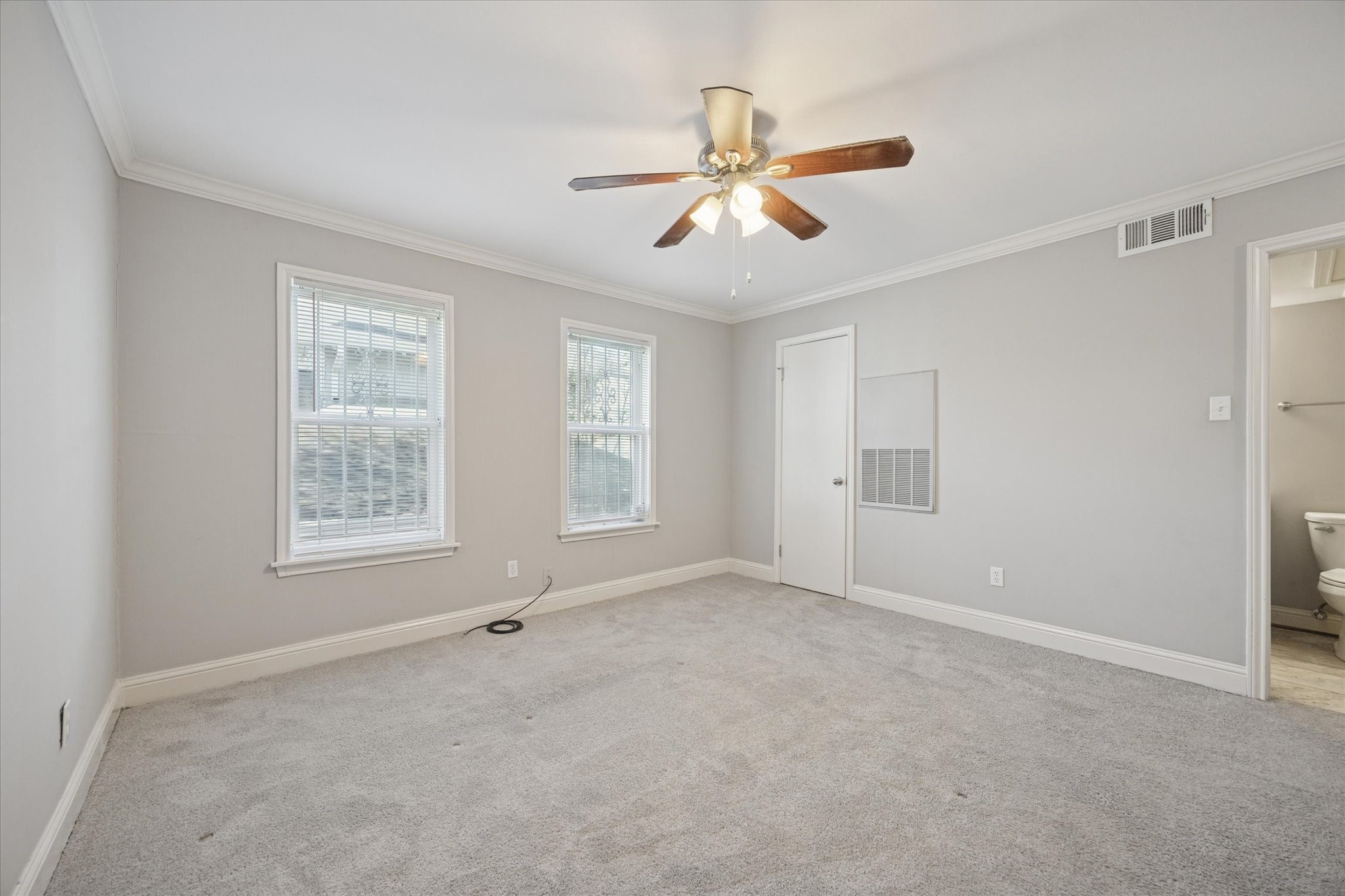 1531 Marshall Street, Unit 1 Houston, TX 77006 - Photo 12 of 19 Another view of the bedroom highlights the roomy layout and fantastic natural light, making it easy to design a comfortable retreat that fits your style.