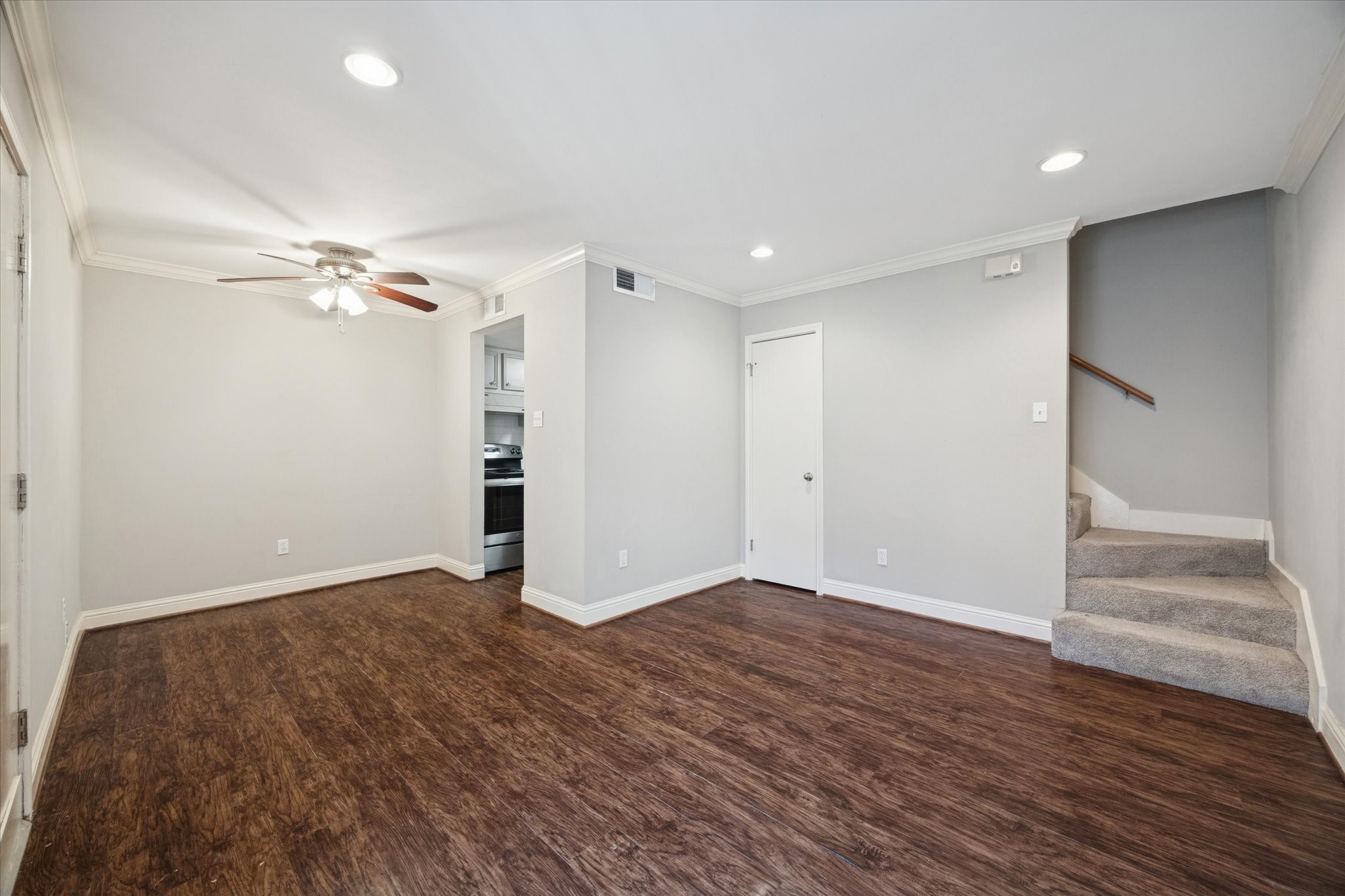 1531 Marshall Street, Unit 1 Houston, TX 77006 - Photo 6 of 19 The open living and dining layout creates an easy flow for comfortable daily living and easy entertaining. With wood-look flooring and neutral paint throughout, it's a welcoming space primed for your personal touches.