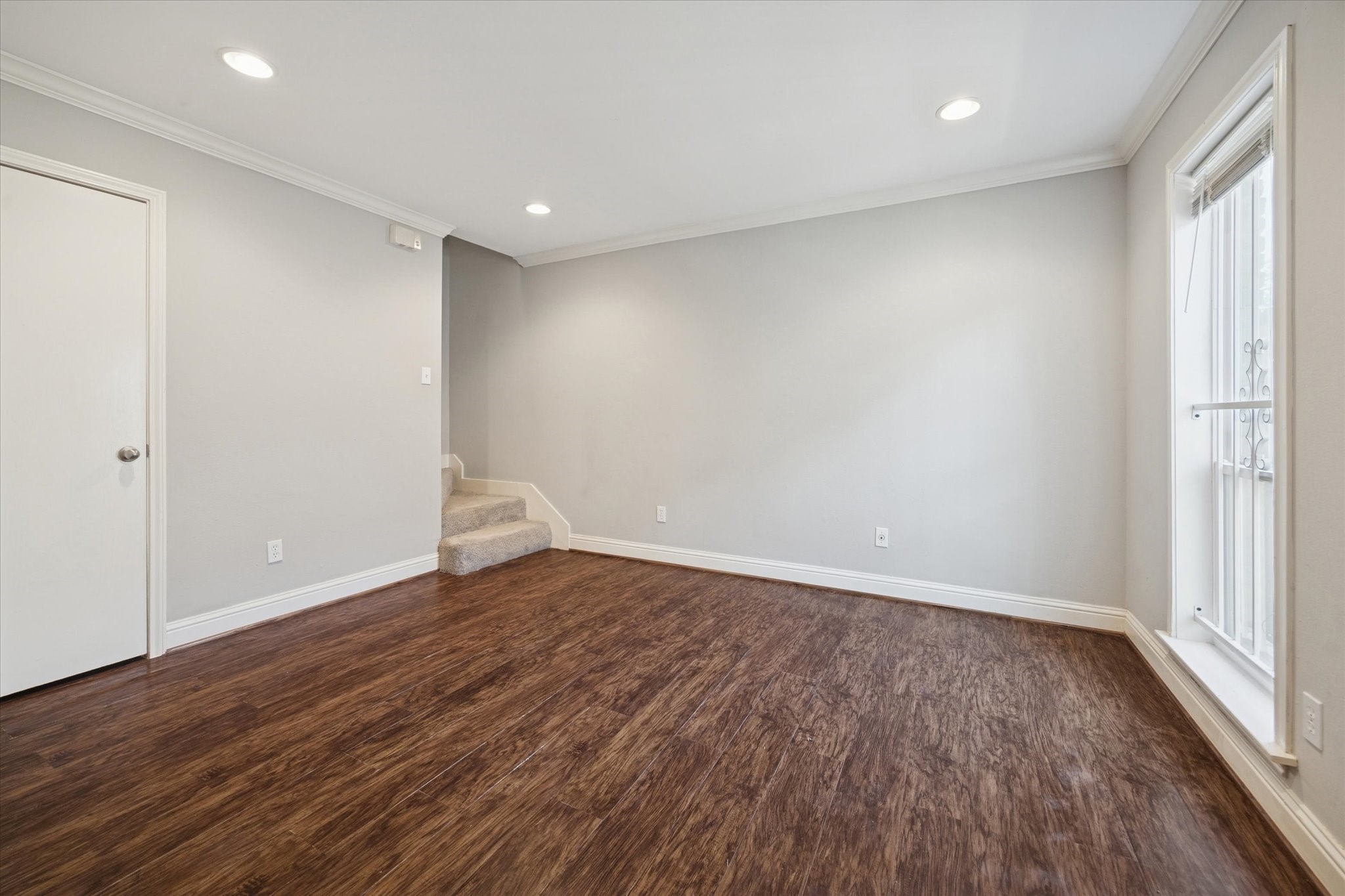 1531 Marshall Street, Unit 1 Houston, TX 77006 - Photo 8 of 19 The spacious living room gives you plenty of room to relax, entertain, or design the setup that fits your lifestyle, all just steps from everything Montrose has to offer.