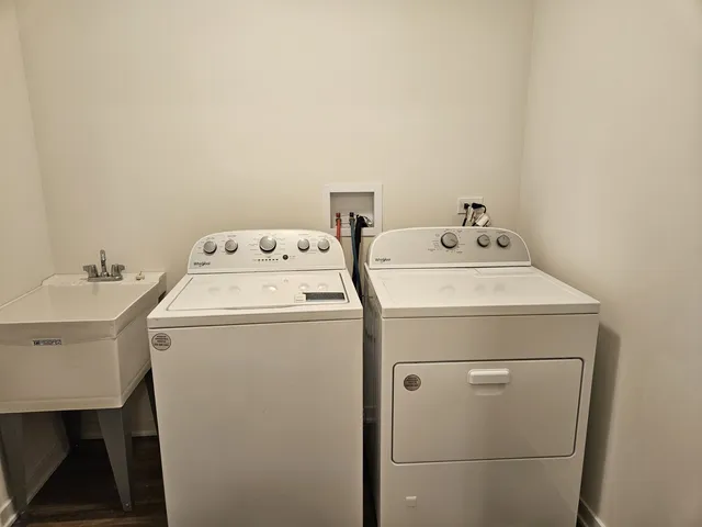 a utility room with dryer and washer
