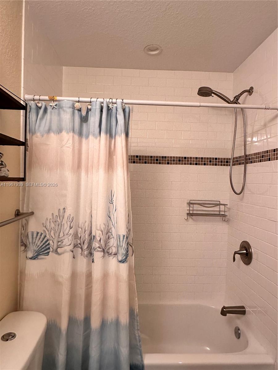 24 Tarpon Avenue Key Largo, FL 33037 - Photo 16 of 22 a bathroom with a shower