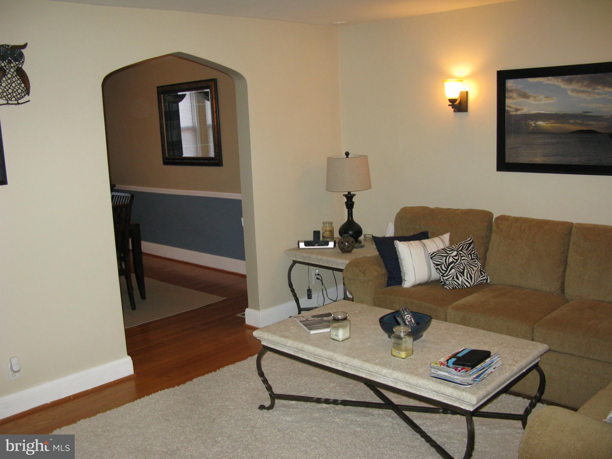 60 Murdock Road Baltimore, MD 21212 - Photo 3 of 30 a living room with a couch and a coffee table