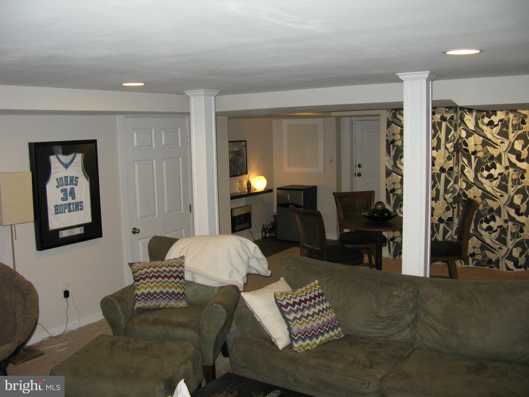 60 Murdock Road Baltimore, MD 21212 - Photo 22 of 30 a living room with furniture and wooden floor