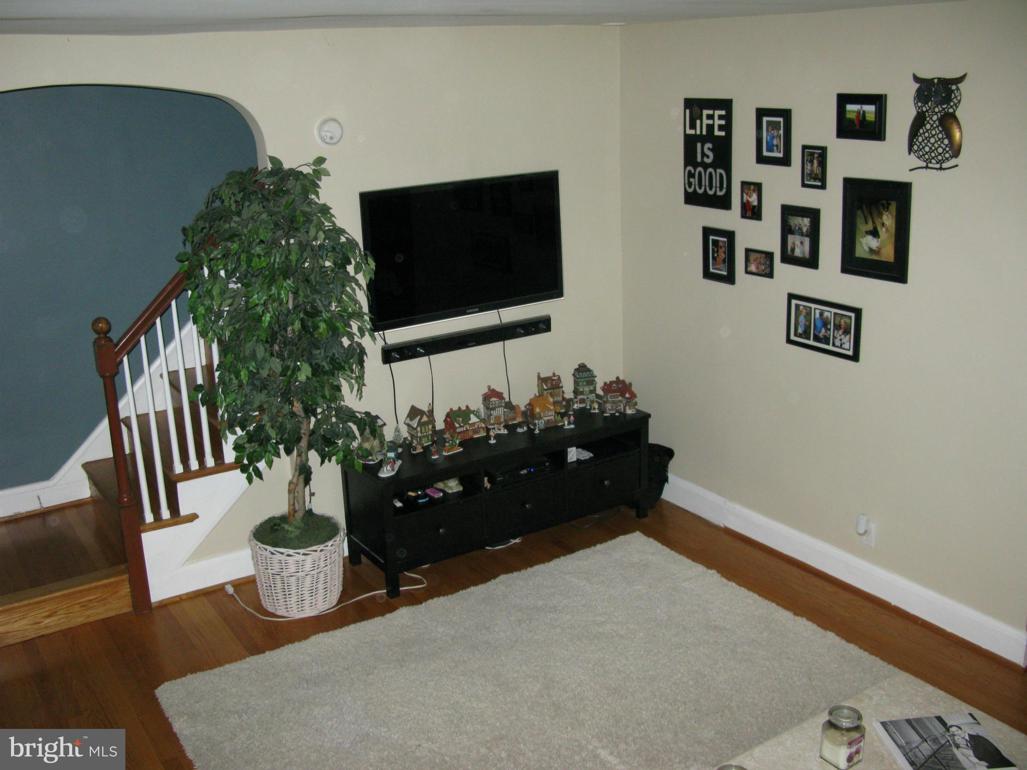 60 Murdock Road Baltimore, MD 21212 - Photo 4 of 30 a living room with furniture and a flat screen tv