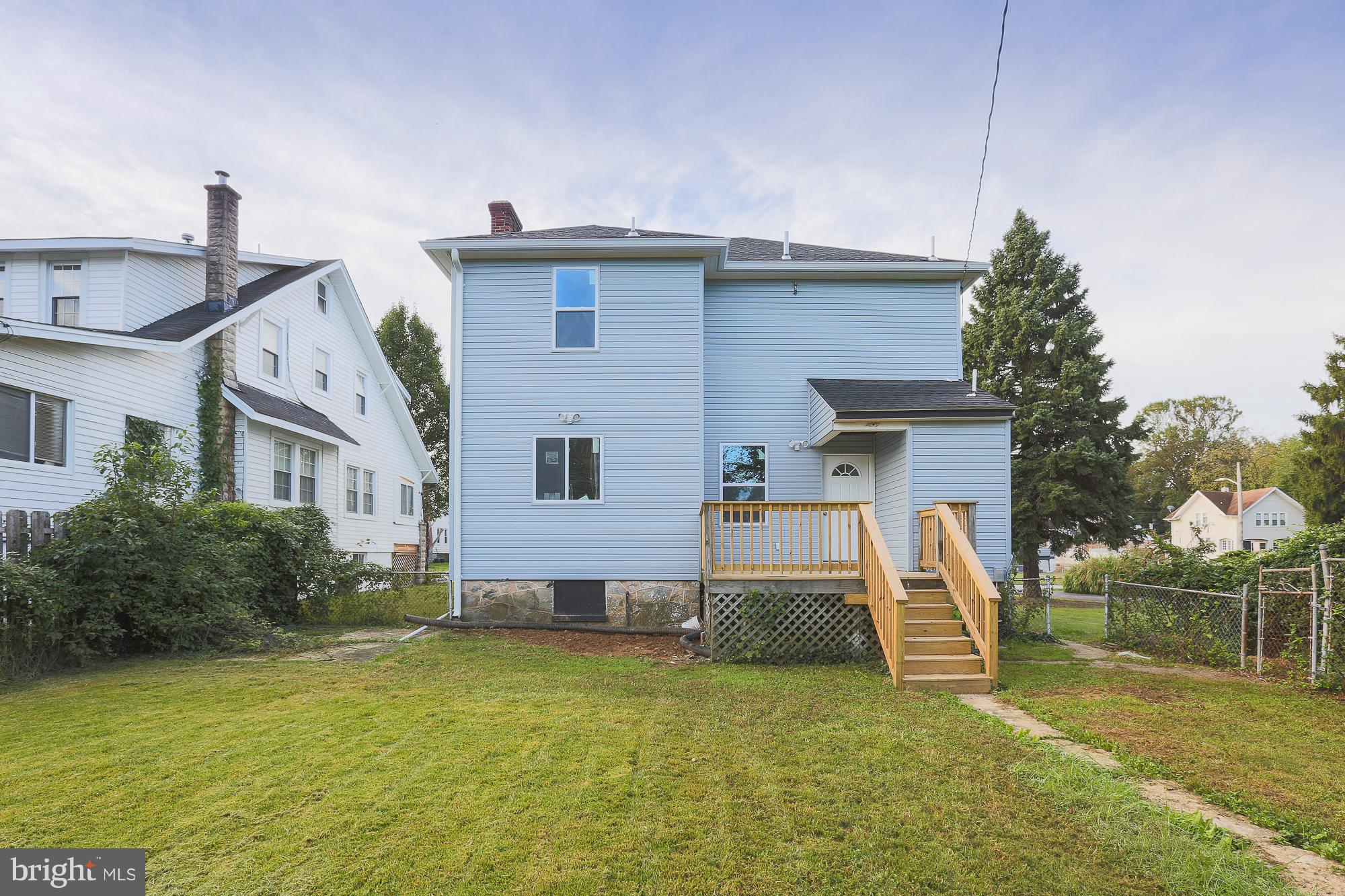 4216 Ridgewood Avenue Baltimore, MD 21215 - Photo 16 of 29 Exterior rear-Patio leads to huge private yard
