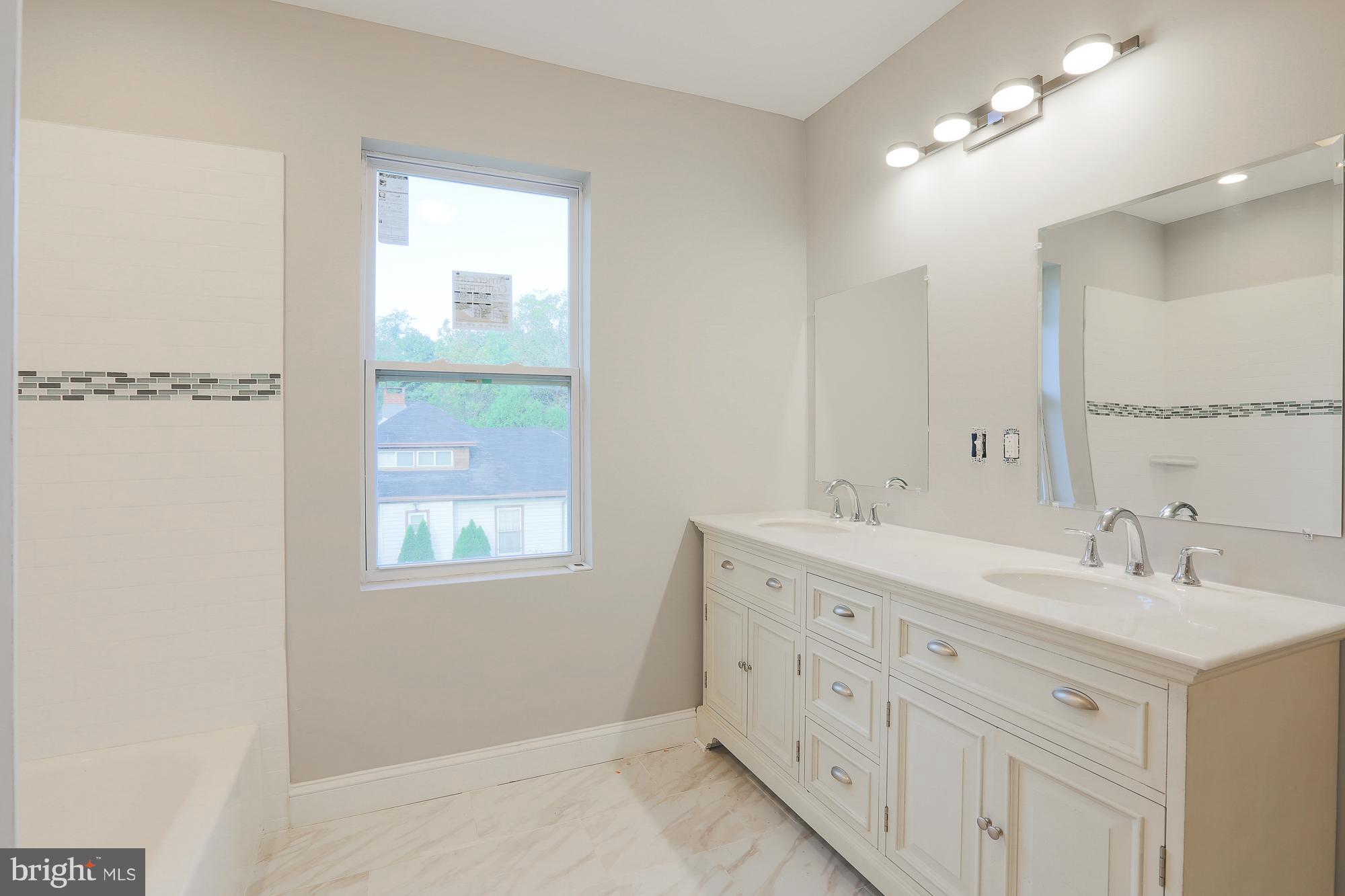 4216 Ridgewood Avenue Baltimore, MD 21215 - Photo 23 of 29 Upper Level bath