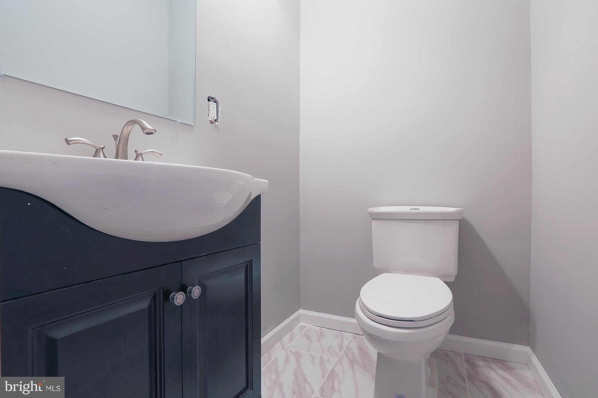 4216 Ridgewood Avenue Baltimore, MD 21215 - Photo 8 of 29 Beautiful Bath downstairs