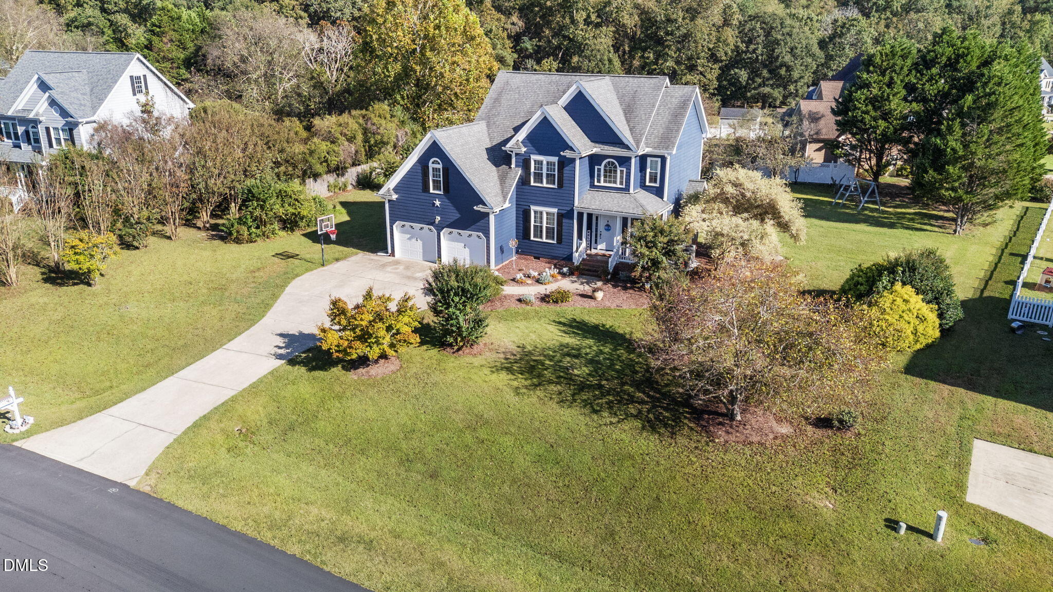 1617 Kendall Hill Road Willow Spring, NC 27592 - Photo 10 of 58 a view of a house with a yard