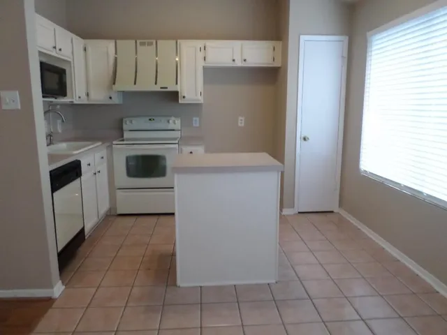 a view of a room that has a window in it