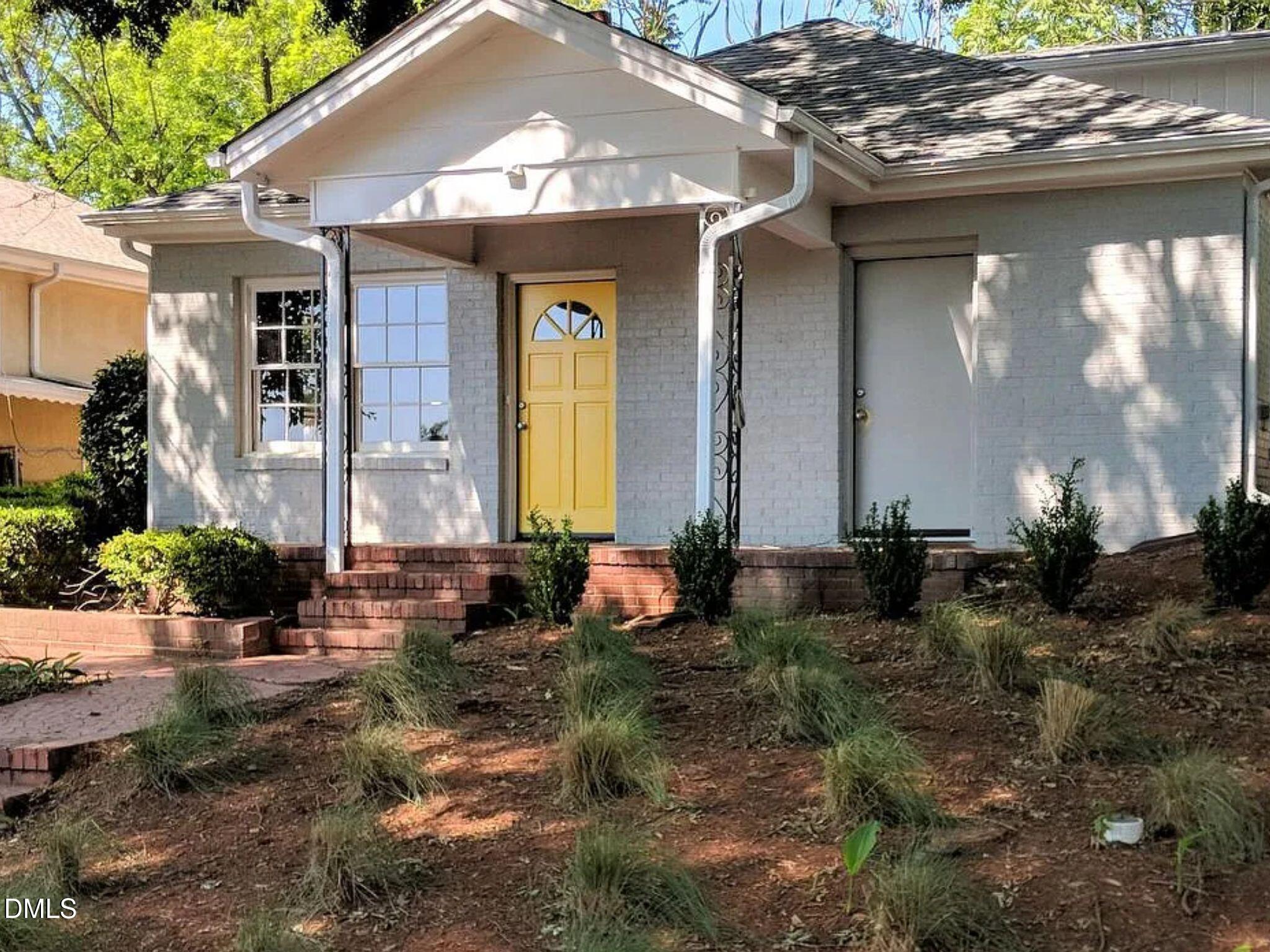 15 North Fisher Street Raleigh, NC 27610 - Photo 1 of 14 a front view of house with yard