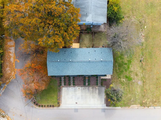 an aerial view of residential house with outdoor space