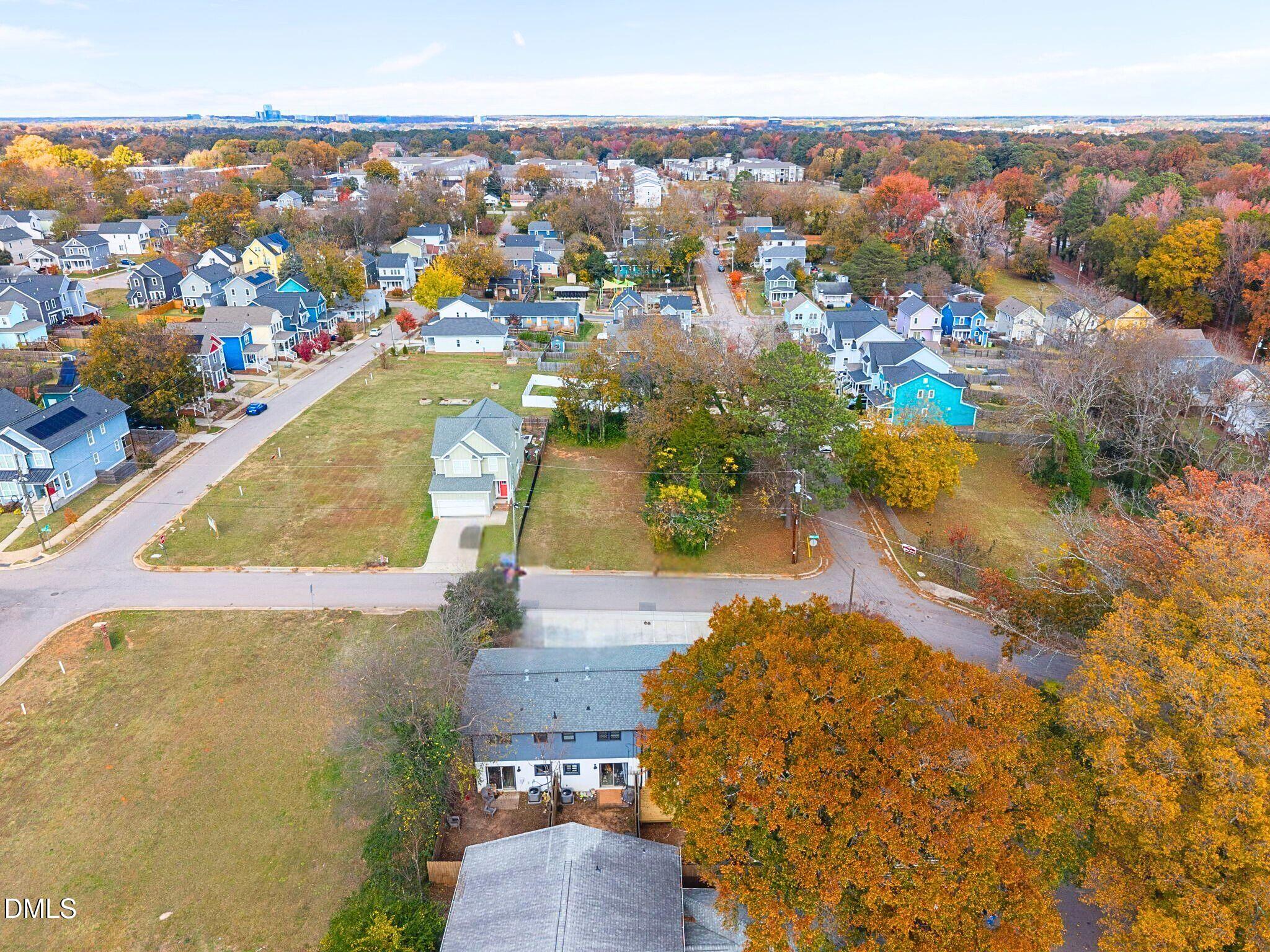 15 North Fisher Street Raleigh, NC 27610 - Photo 10 of 14 an aerial view of a house with a swimming pool