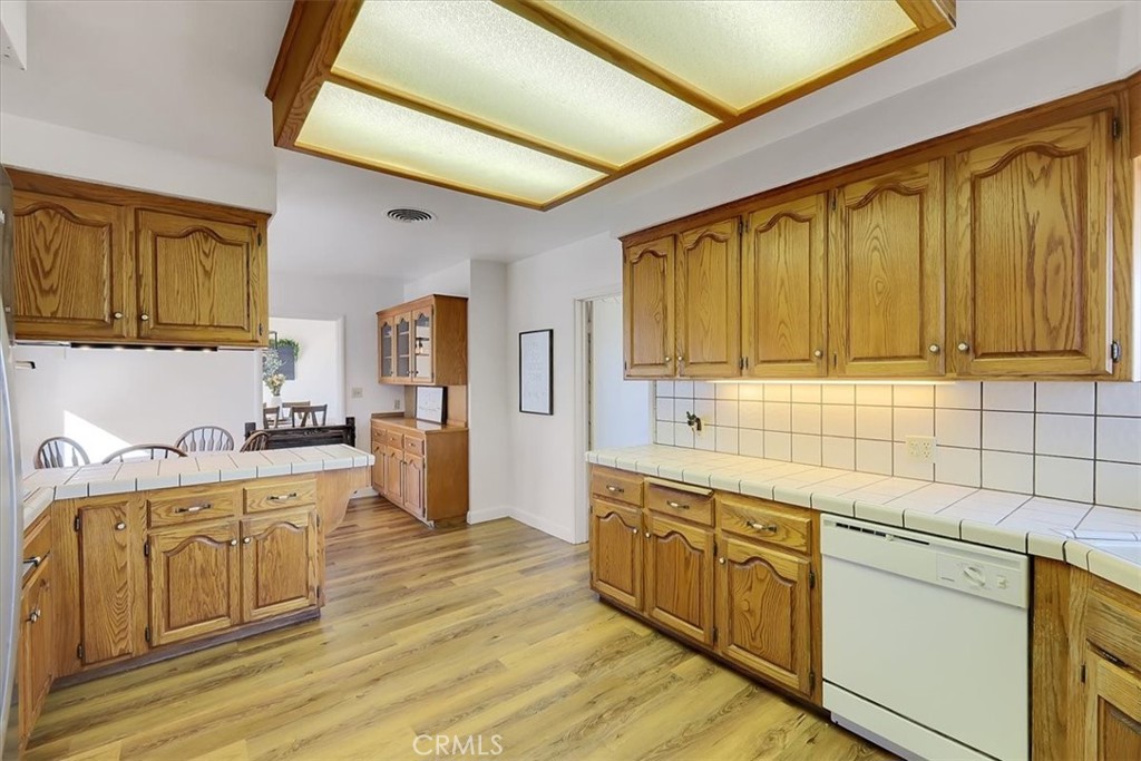 1255 Richvale Highway Richvale, CA 95974 - Photo 14 of 49 a kitchen with a sink and wooden cabinets